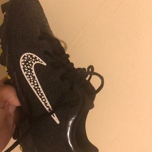 Black cleats with white Nike sign need gone ASAP .